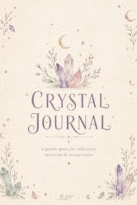 Soft beige journal cover with watercolor crystals, moons, and sprigs; reads 'Crystal Journal' inviting reflection.